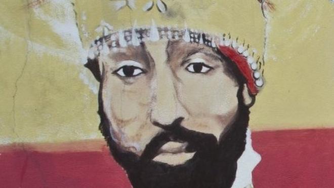 A mural depicting (L to R) Ethiopian Emperor Haile Selassie I, Jamaican Reggae legend Bob Marley in Kingston, Jamaica