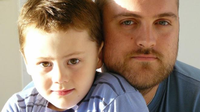 Elliot who has autism with his father Ian
