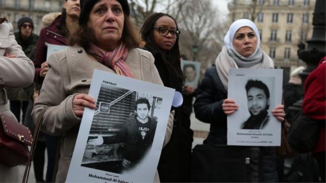 Activists hold portraits of detained or missing Syrians at a demonstration in Paris, France, organised by "Families for Freedom" (27 January 2018)