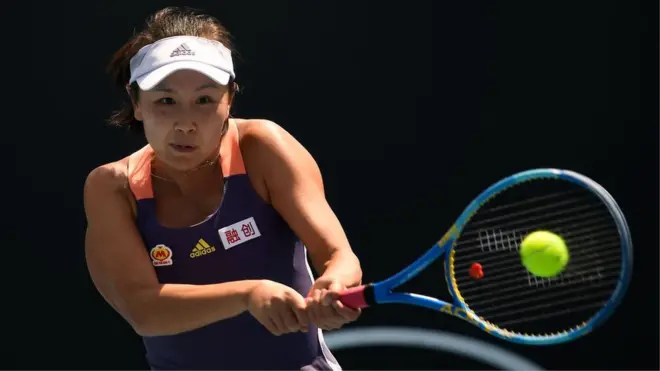 Peng Shuai hits a tennis ball
