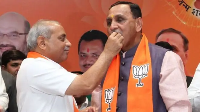 નીતિન પટેલ તથા વિજય રૂપાણીની તસવીર