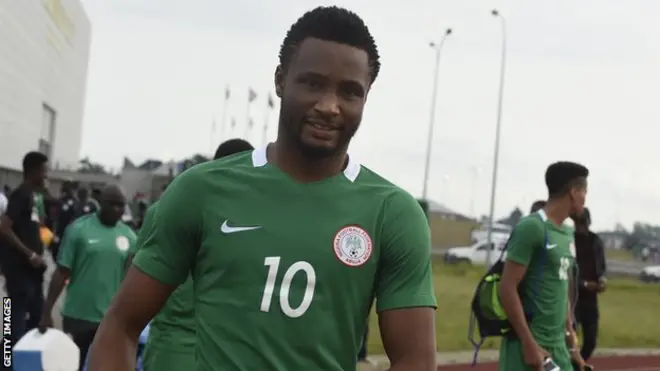 John Mikel Obi scored a rare goal as he captained Nigeria to a 4-0 win over African champions Cameroon