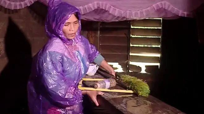lady moving furniture flood