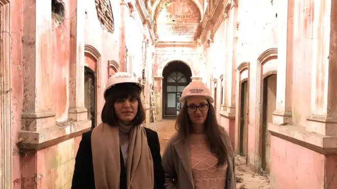 Oana Chirila (L) and Cristina Apostol decided to set up the project to save the 19th Century building