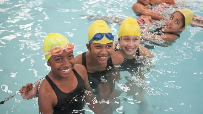 Small pikin inside swimming pool