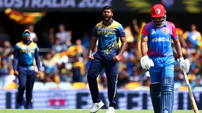 BRISBANE, AUSTRALIA - NOVEMBER 01: Lahiru Kumara of Sri Lanka celebrates after taking the wicket of Rahmanullah Gurbaz of Afghanistan during the ICC Men's T20 World Cup match between Afghanistan and Sri Lanka at The Gabba on November 01, 2022 in Brisbane, Australia.