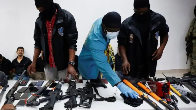 Haiti police presented weapons and some of the detained suspects to the media on Wednesday