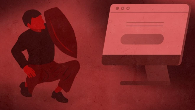 Човек који се штитом брани од рачунара