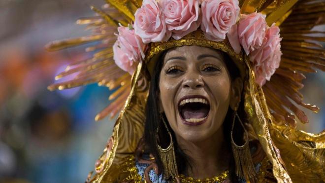 A reveller of the Beija-Flor samba school performs during the second night of Rio"s Carnival at the Sambadrome in Rio de Janeiro, Brazil, on February 13, 2018. / AFP PHOTO / Mauro PIMENTELMAURO PIMENTEL/AFP/Getty Images