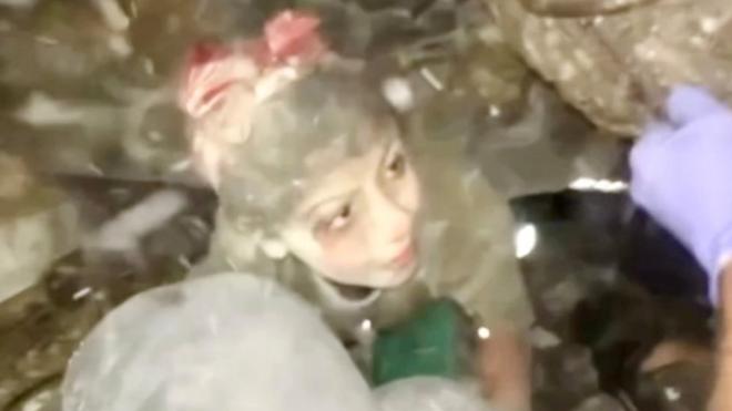 Helmet-cam footage showing Alma Jaroor emerging from the rubble of a building destroyed in a reported Israeli air strike in Gaza City on 2 December 2023