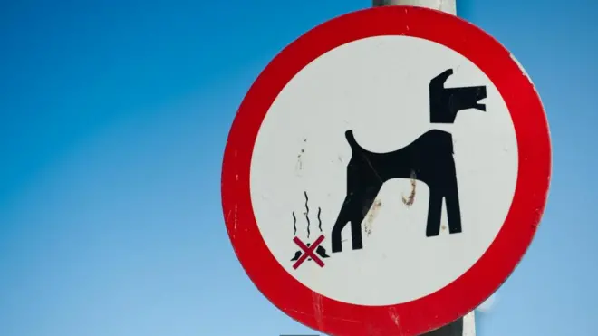 Знак "Приберіть за своїм собакою"