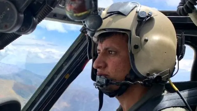 Mohammad Edris Momand flying his helicopter above Afghanistan