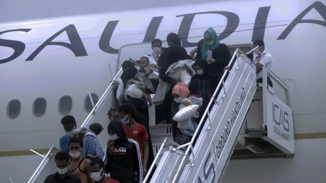 Ethiopian migrants returned from Saudi Arabia arrive at Bole International Airport in Addis Ababa, Ethiopia on July 7, 2021