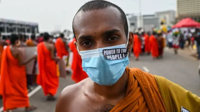 Buddhist monks participate in an anti-government demonstration outside the President's office in Colombo on May 3, 2022, demanding President Gotabaya Rajapaksas resignation over the country's crippling economic crisis.