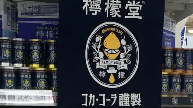 The new cans in a supermarket shelf