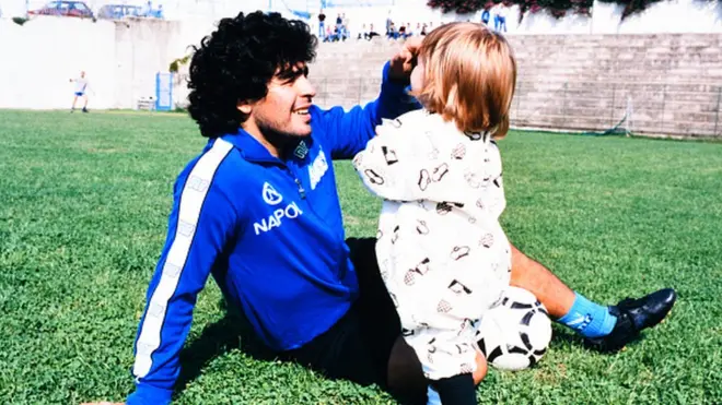 Maradona with his daughter Dalma in 1989