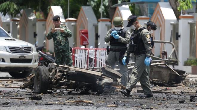 Police investigators inspect the wreckage of car bomb following an explosion outside a government office Southern Border Provinces Administrative Centre in Thailand March 17, 2020