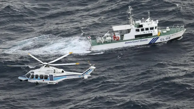 Japan's coast guard is conducting search and rescue operations.