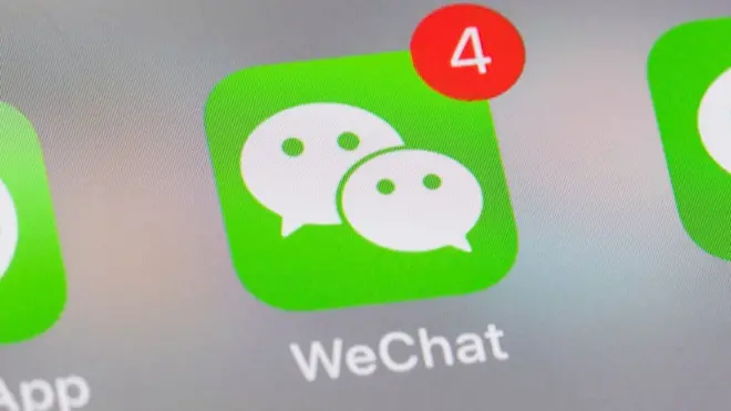 smart phone with the icons for the social networking apps WeChat and others