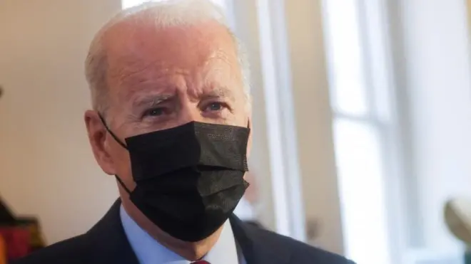 Mr Biden spoke to reporters about Ukraine as he visited a Washington clothing store