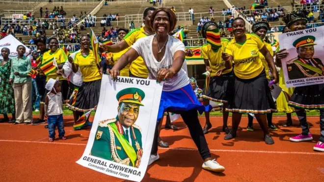 Zimbabwe people dey happy as power don change hand for di country