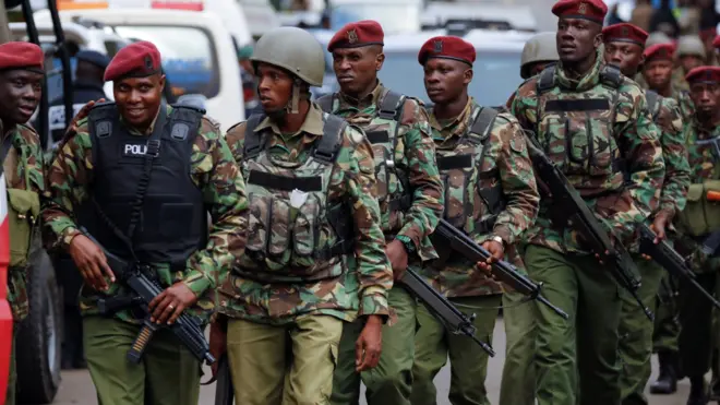 Kenyan security forces return from inside the hotel - 16 January