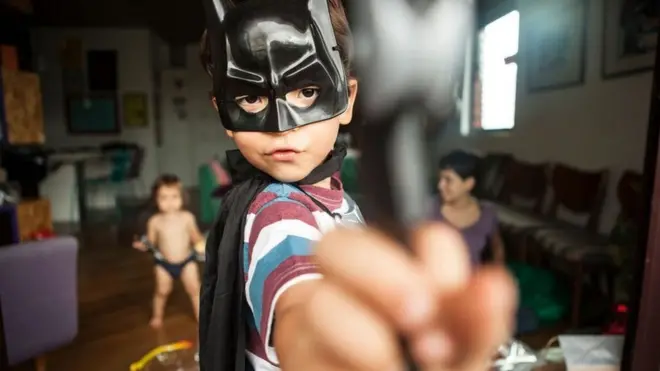 Joao in a Batman costume