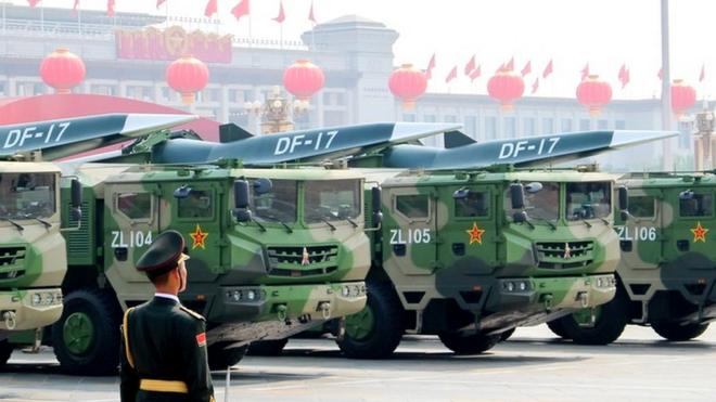 Image shows DF-17 medium-range ballistic missiles equipped with a DF-ZF hypersonic glide vehicle, involved in a military parade to mark the 70th anniversary of the Chinese People's Republic
