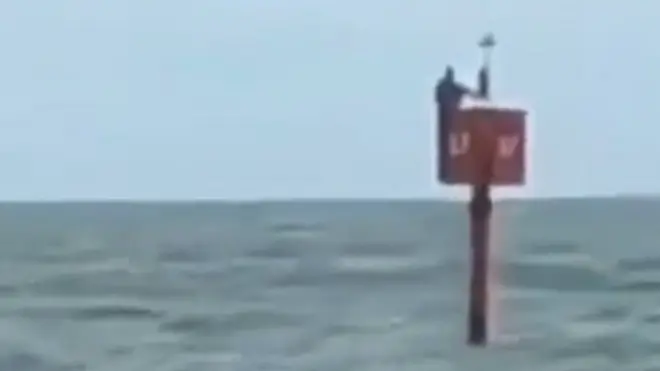 The fisherman was found on a signal buoy two days after he had fallen from board his boat