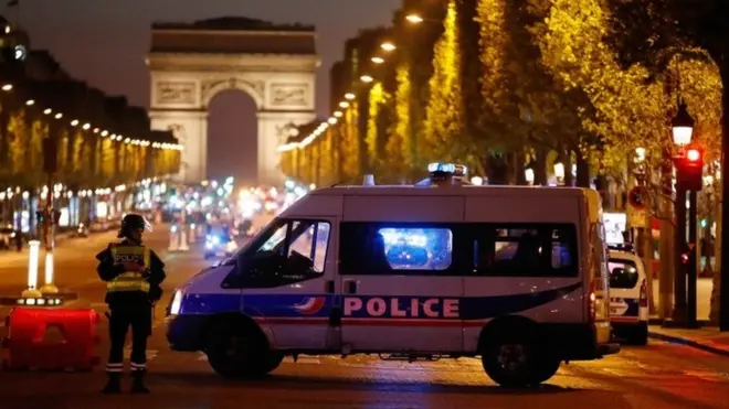 Police secure the Champs-Elysees in Paris