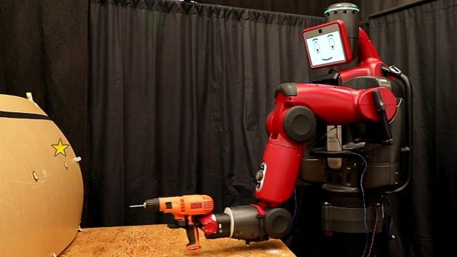 A robot holding a drill