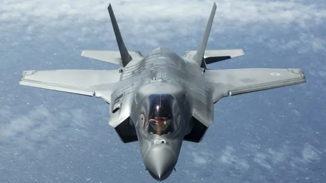 A F-35B Lightning II jet flying over the UK