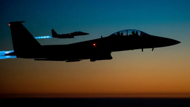 File photo taken by the US Air Force shows a pair of US Air Force F-15E Strike Eagles flying over northern Iraq early on 23 September 2014