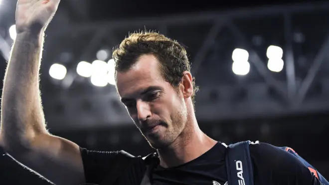 Andy Murray waves to the crowd after losing to Roberto Bautista Agut