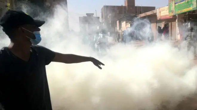 Riot police fired tear gas in an attempt to break up protesters in the capital city, Khartoum.