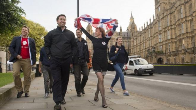 Vote Leave supporters celebrate their victory at Westminster on Friday