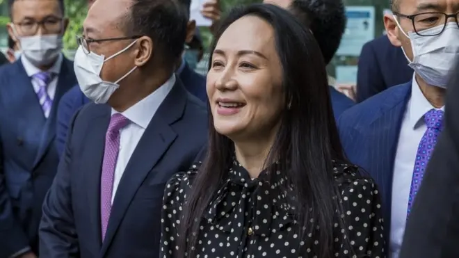 Meng Wanzhou (C) leaves British Columbia Supreme Court