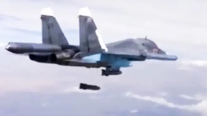 Russian Su-34 bomber drops bombs in file photo from video footage provided by Russian Defence Ministry 09/12/2015