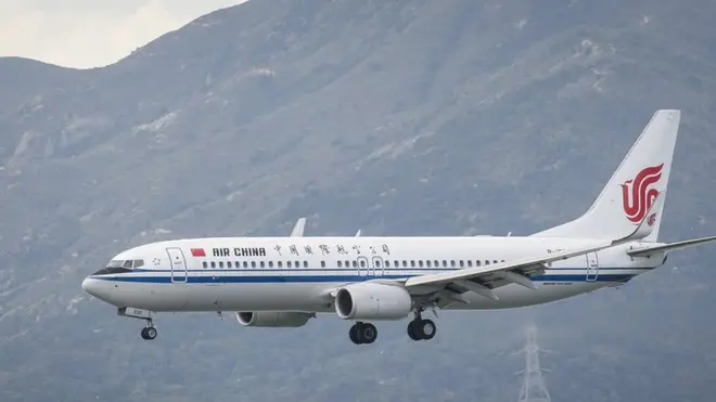 A Boeing 737-89L passenger plane belonging to the Air China lands at Hong Kong International Airport on August 01 2018 in Hong Kong, Hong Kong.