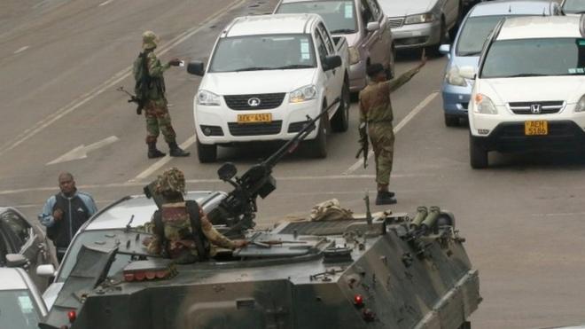 Soldier direct traffic in Harare