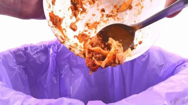 Familes in the UK waste an estimated £700 a year by throwing food away