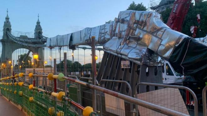 London's Hammersmith Bridge wrapped in foil