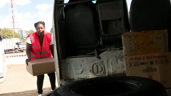woman carrying a package
