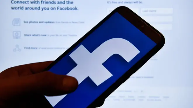 In this photo illustration a Facebook logo seen displayed on a smartphone.