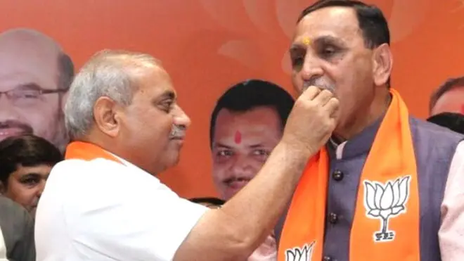 નીતિન પટેલ તથા વિજય રૂપાણીની તસવીર