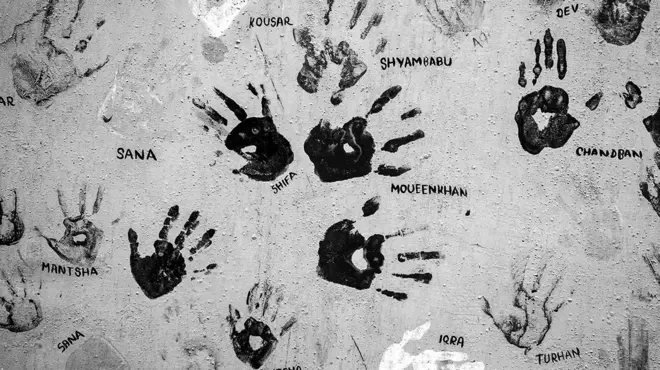 Hand prints of children who have been treated at the Chingari Trust physical therapy clinic