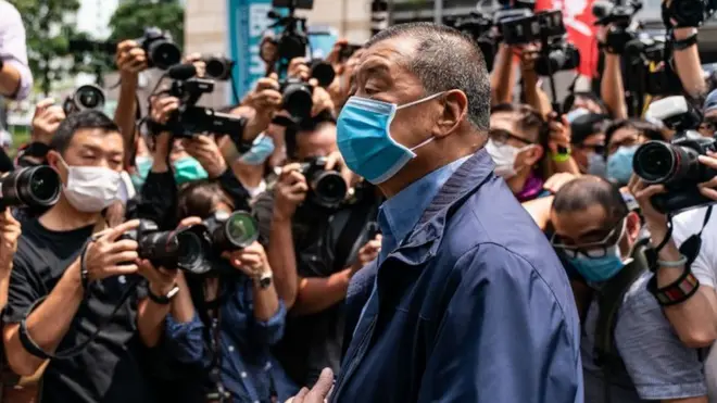 Hong Kong media tycoon and founder of Apple Daily newspaper Jimmy Lai arrives at the West Kowloon Magistrates' Court on May 18, 2020 in Hong Kong,