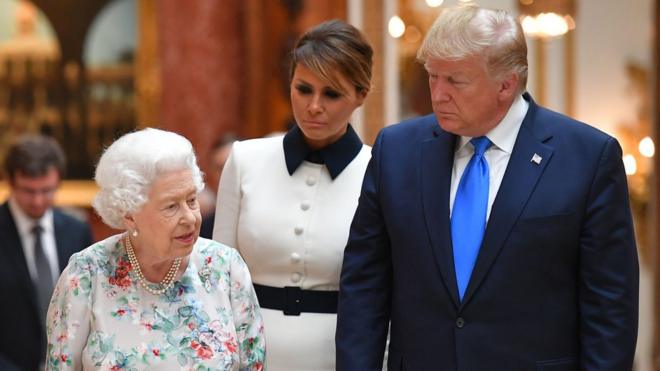 Queen Elizabeth shows Mr Trump and the First Lady items on display