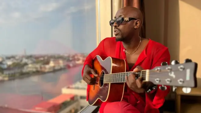 Bien of disbanded Sauti Sol plays the guitar