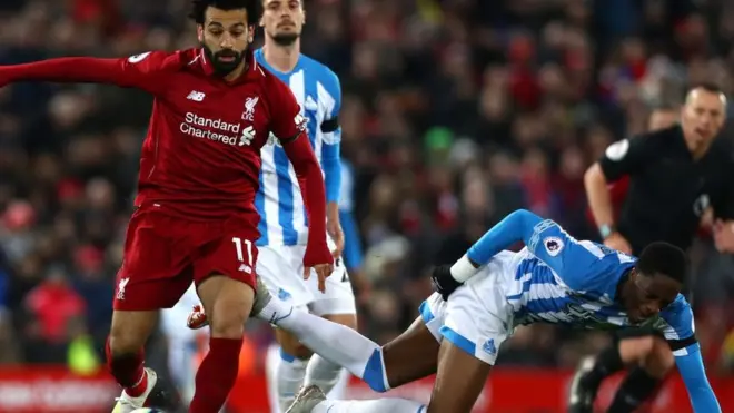 احتفظ محمد صلاح بلقب هداف الدوري الإنجليزي بعد تسجيل هدفين في هدرسفيلد